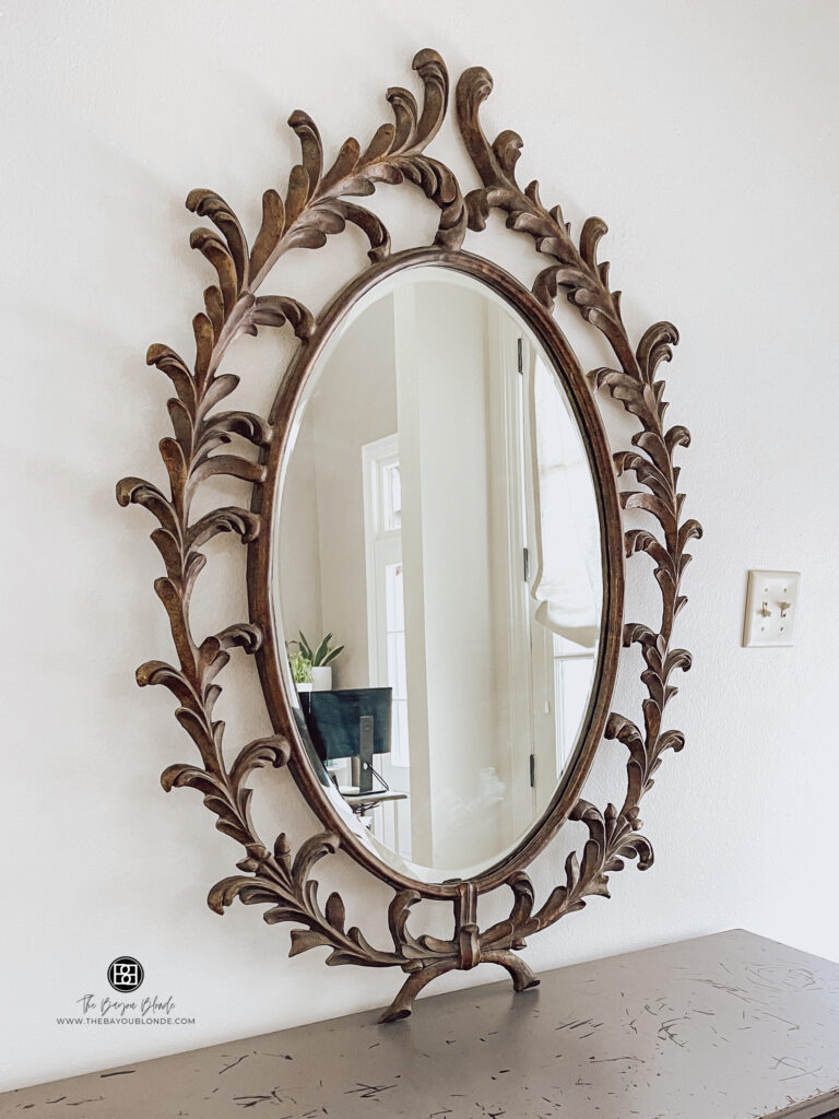 ornate bronze mirror